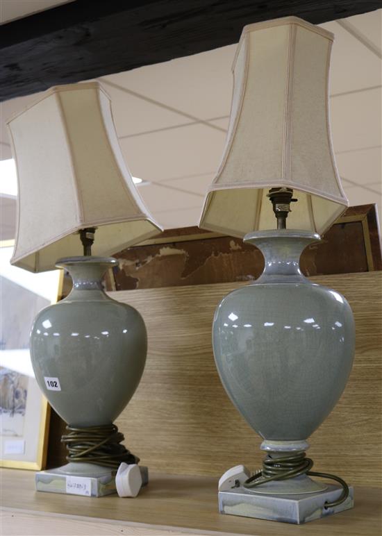 A pair of celadon glazed ovoid shaped table lamps H.41cm